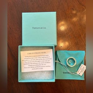 PERFECT! Never worn! Tiffany size 7 heart ring. Box, tags, duster case.